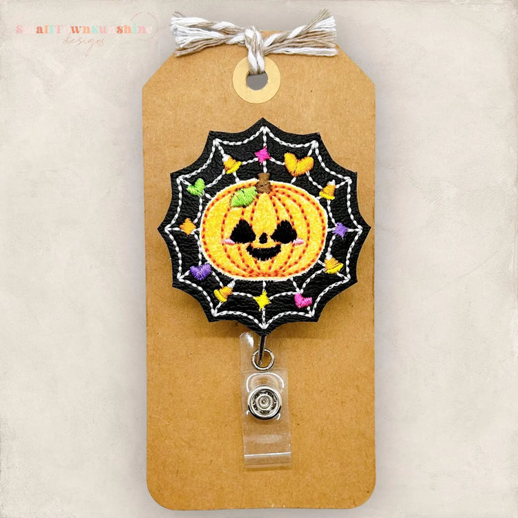 Pumpkin Spiderweb Badge Topper