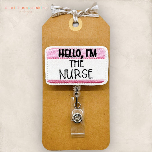 hello I'm the nurse pink name tag badge reel