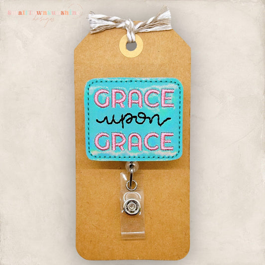 grace upon grace embroidered badge reel