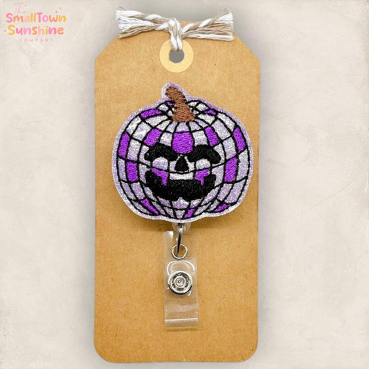 Purple Disco Pumpkin Retractable Badge Reel: Halloween ID Holder, Name Tag, Topper, Coworker Gift, Lanyard, MRI Safe, Heavy Duty | GLITTER