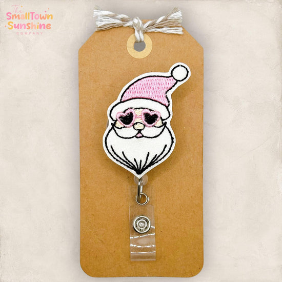 Pink Retro Santa Retractable Badge Reel: Christmas ID Holder, Name Tag, Topper, Coworker Gift, Lanyard, MRI Safe, Heavy Duty Clip | GLITTER