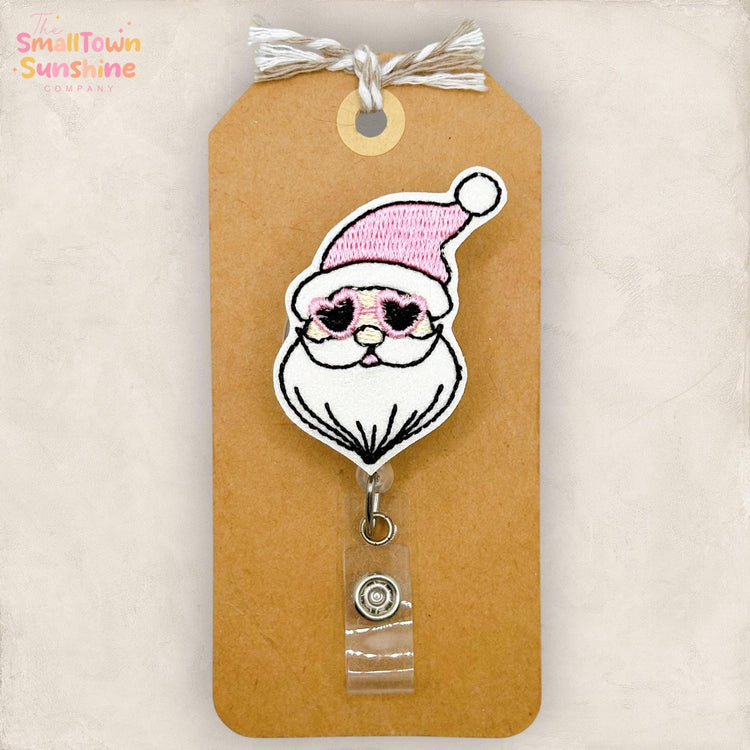 Pink Retro Santa Retractable Badge Reel: Christmas ID Holder, Name Tag, Topper, Coworker Gift, Lanyard, MRI Safe, Heavy Duty Clip | GLITTER
