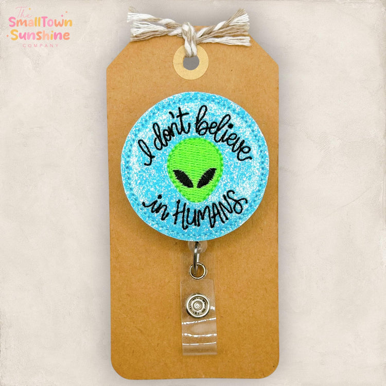 I Don’t Believe in Humans Retractable Badge Reel: Alien ID Holder, Name Tag, Topper, Coworker Gift, Lanyard, MRI Safe, Heavy Duty | GLITTER
